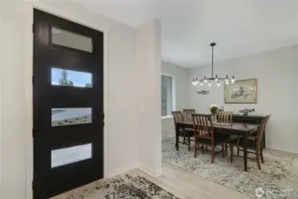 Open entry/foyer and formal dining room