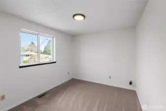 BEDROOM 3 | Located at the front right corner of the home.