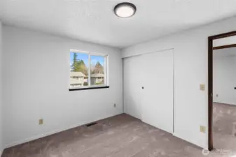 BEDROOM 4 | Located at the front left corner of the home overlooking the street.