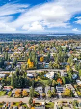 Looking west over building lot towards lakes and downtown Seattle