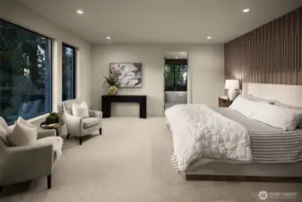 Large primary suite with custom accent wall