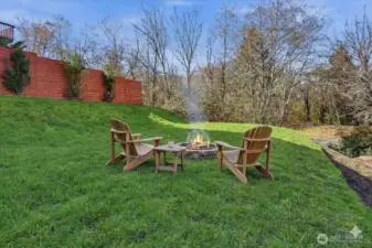 Lower yard has many fun uses! Home sits on Over a third of an Acre!