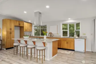 An abundance of quartz counter space provides plenty of work surface for the chef of the house