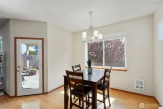 Dining room with door to covered patio