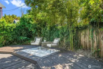 The back-yard is all decked for low-maintenance yard care.