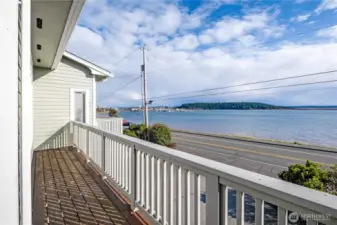 The deck extends the entire width of the unit.