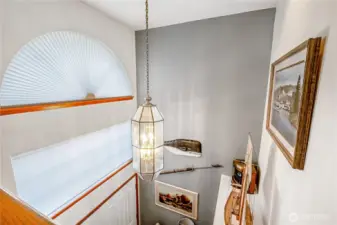 The the front entrance include 20 ft. high ceilings and expansive windows.