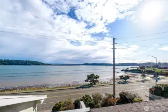 Beautiful view from primary bedroom balcony. Perfect spot for morning coffee.