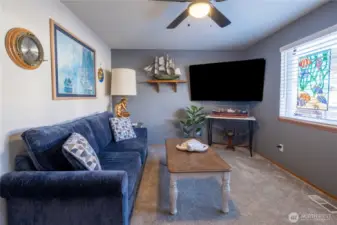 Possible main level living in this bonus/den room