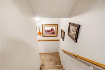 Head downstairs to the storage room and garage