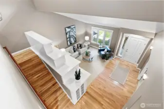 Beautiful view from the upstairs into the livingroom.
