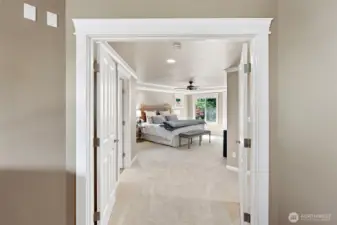 Primary bedroom overlooking the landscape.