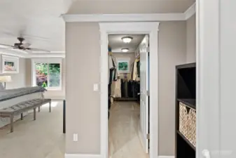 Walk-in closet in primary bedroom.