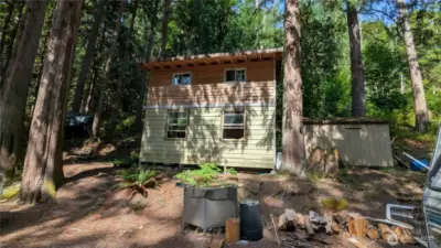 Cabin with storage shed