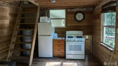 Stairway (ladder steps) to loft, ceiling needs finishing along with part of wall covering
