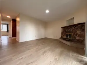 Spacious living space with cozy fire place