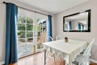 French doors to the private backyard.