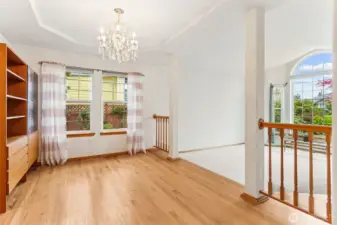 Spacious dining room with lovely garden view from the window.