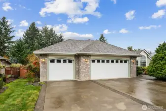 3 car garage offers extra parking or storage!