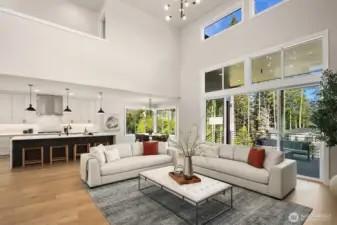 Soaring two story ceilings in great room. Photo is of our previous furnished Model Home in phase 1