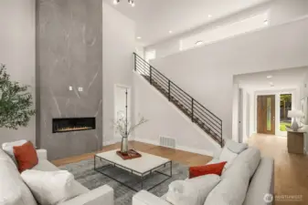 Soaring two story ceilings in great room. Photo is of our previous furnished Model Home in phase 1