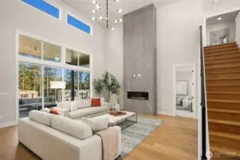 Soaring two story ceilings in great room. Photo is of our previous furnished Model Home in phase 1