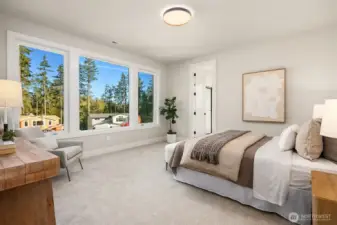 Guest suite on main with 3/4 attached bath Photo is of our previous furnished Model Home in phase 1