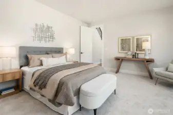 Guest suite on main with 3/4 attached bath Photo is of our previous furnished Model Home in phase 1