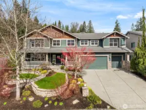 Stunning curb appeal showcases this impeccable John Day home in the coveted Issaquah Highlands community, featuring a three-car garage, professional landscaping.