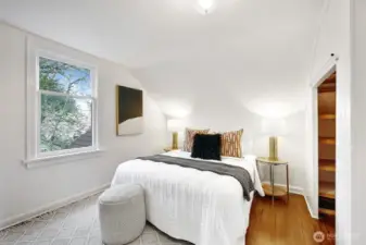 Second floor bedroom with 2 closets and refinished wood floor.