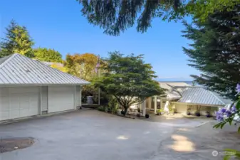 A heated 3 car garage offers plenty of parking, storage, and room for hobbies