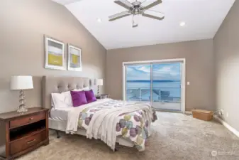 Primary Bedroom With High Ceilings, Large Slider & Sound Views.