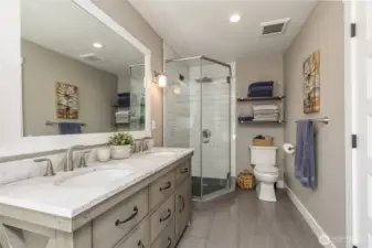 Heated tile floors and dual sinks in the primary bath