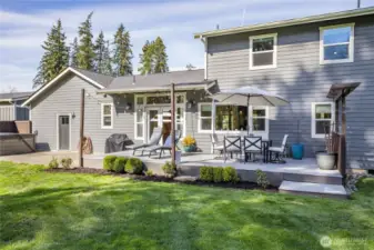 Large deck off the kitchen (and a hot tub just across the patio!)