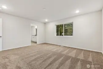 Primary Bedroom-Disclaimer- Photos are of another Warren-2448 floor plan from a previous community, photos are for illustrative purposes only. Finishes, flooring, upgrades, or other features may vary.