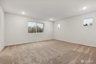 Primary Bedroom-Disclaimer- Photos are of another Warren-2448 floor plan from a previous community, photos are for illustrative purposes only. Finishes, flooring, upgrades, or other features may vary.
