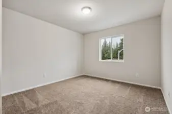 Bedroom #2-Disclaimer- Photos are of another Warren-2448 floor plan from a previous community, photos are for illustrative purposes only. Finishes, flooring, upgrades, or other features may vary.