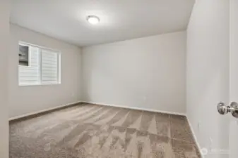 Bedroom #4-Disclaimer- Photos are of another Warren-2448 floor plan from a previous community, photos are for illustrative purposes only. Finishes, flooring, upgrades, or other features may vary.