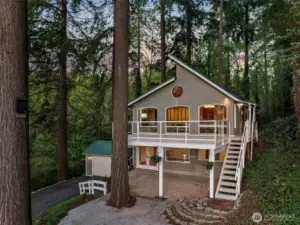 Custom built three Tree Point home in classic NW setting