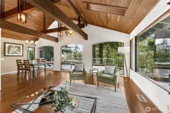 Living area with wood beam vaulted ceilings