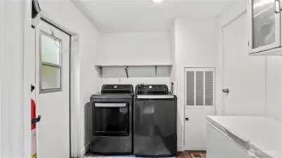 Butlers pantry into the Laundry room.