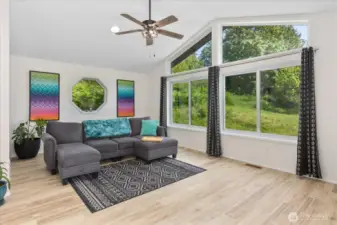 Den/Family Room with vaulted ceilings and tons of natural light.