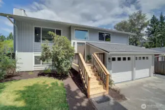 Sunny entrance, new front deck and stairs