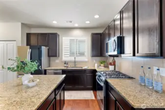 Kitchen with new appliances; granite counters
