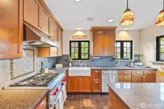 Luxurious kitchen with Wolf range and Sub-Zero fridge creates a beautiful chef's kitchen.