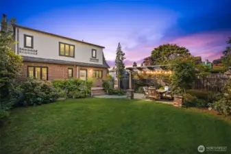 Stunning landscape design compliments the exquisite home perfectly.