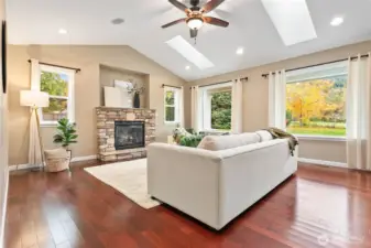 Warm cherry hardwood floors on the main level of the home