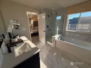 Gorgeous Suoer Primary 5 piece master bath with Upgraded tiles and features. Also featuring a large walk in closet!