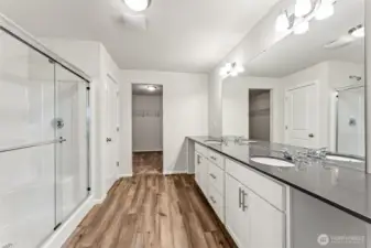 Primary Bath-Disclaimer- Photos are from a similar floor plan from another community, photos are for illustrative purposes only. Finishes, flooring, features, upgrades, countertops, paint, colors, and other features may vary.