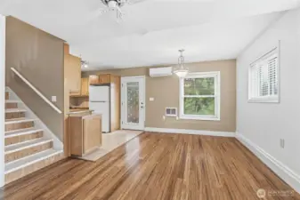 Dining area and kitchen to the left